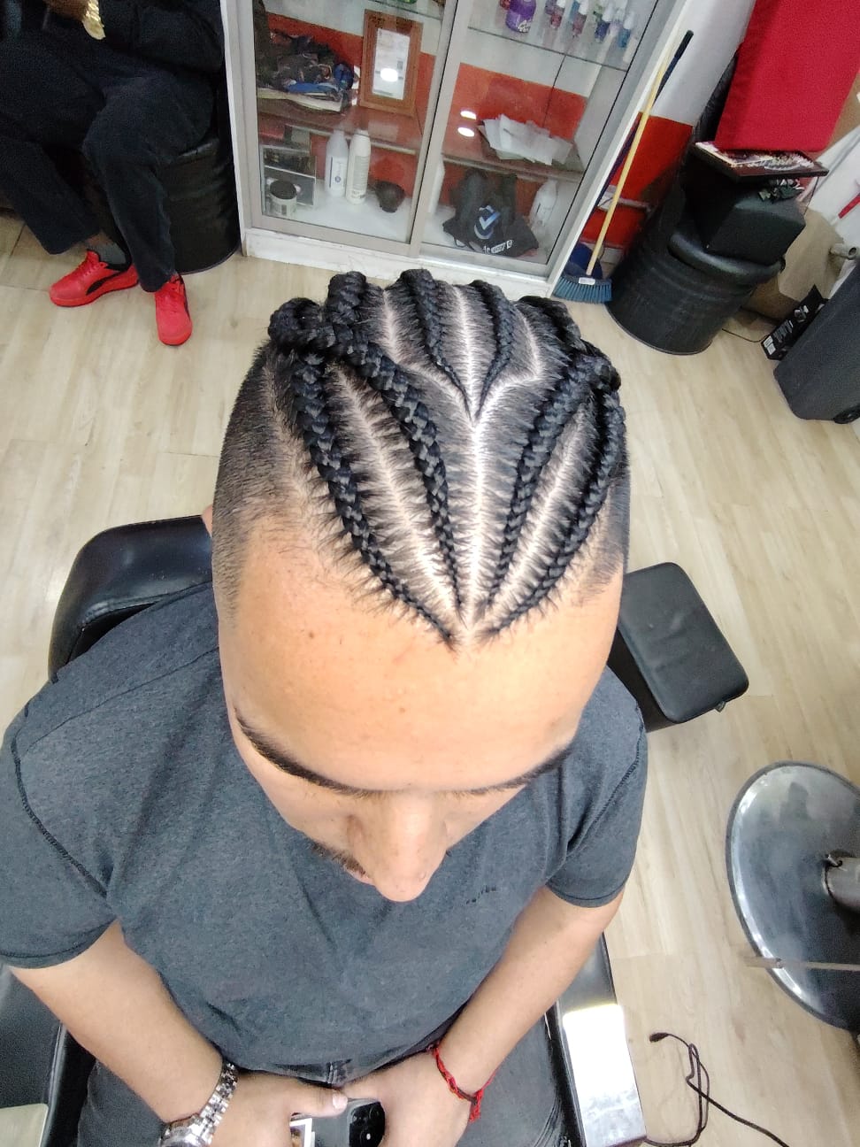 Trenzas realizadas en Barbería California