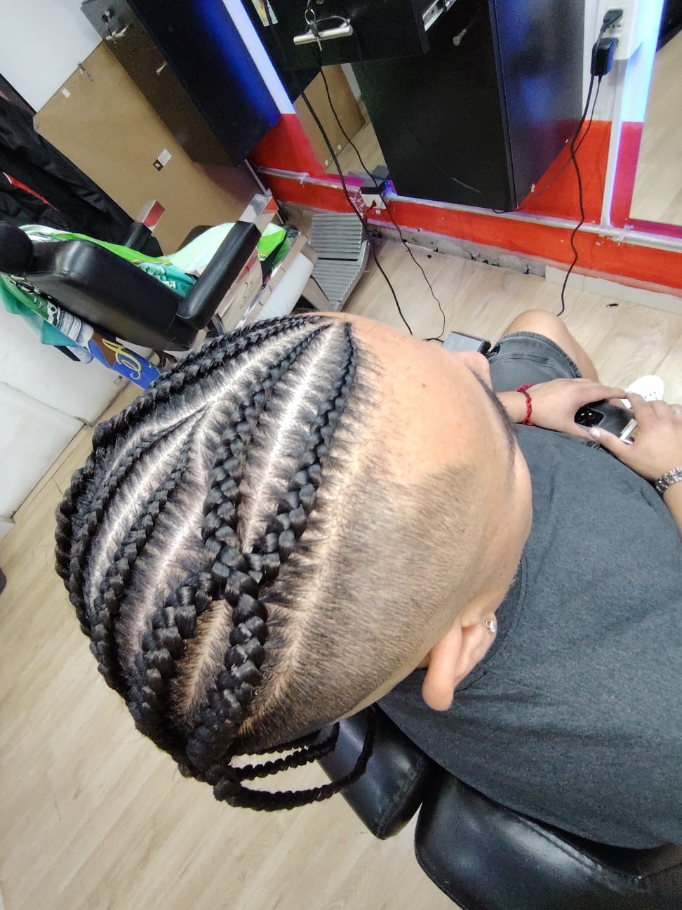 Trenzas realizadas en Barbería California