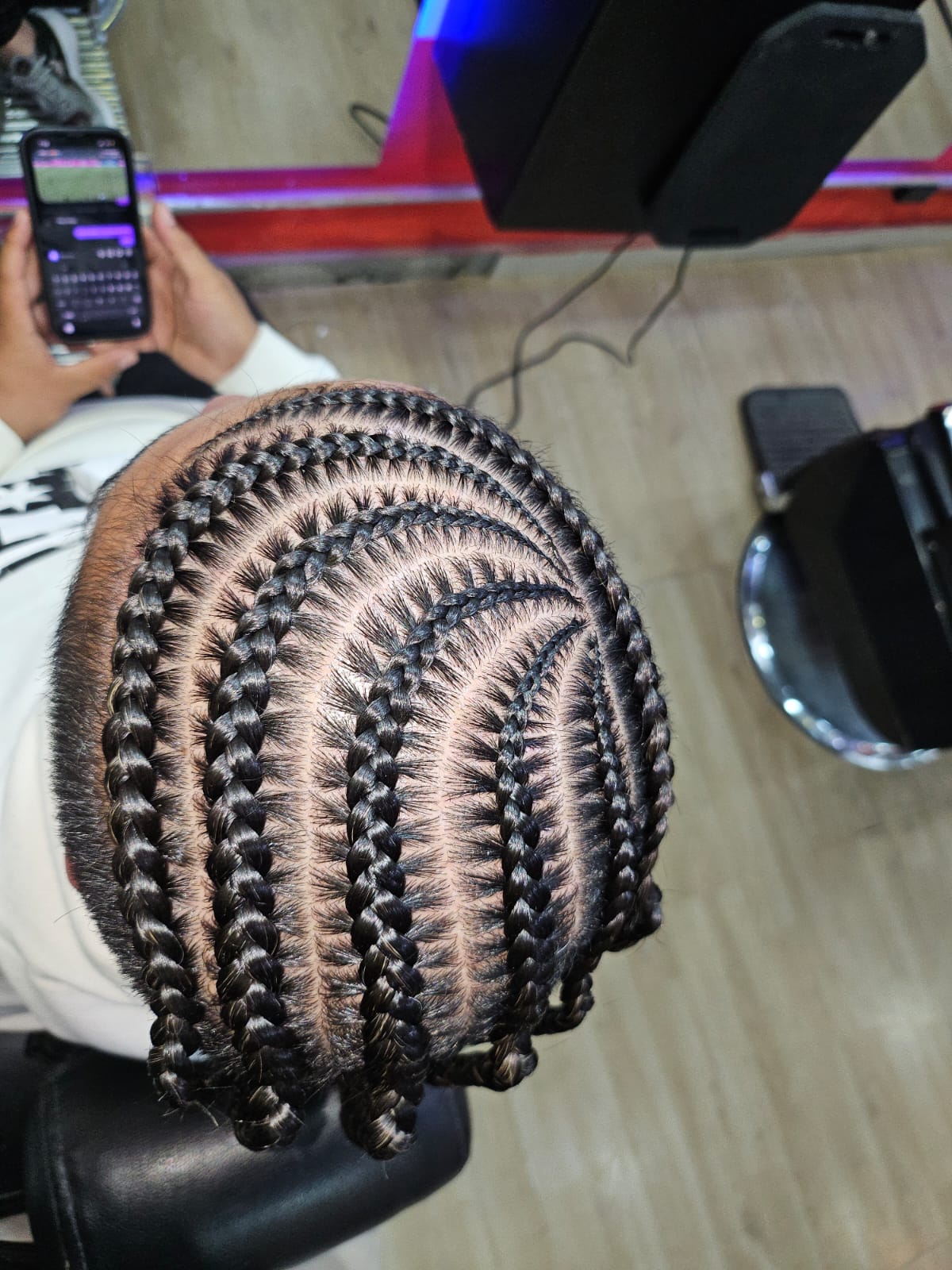 Trenzas realizadas en Barbería California